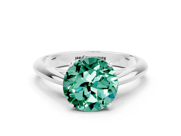 Platinum Round Cut Green Sapphire Solitaire Engagement Ring with Cathedral Setting and Four-Prong Mount