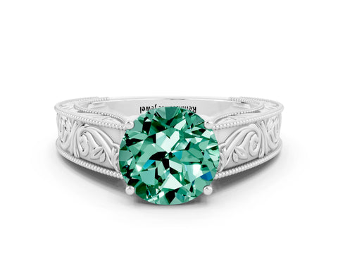 White gold Round Cut Green Sapphire Solitaire Ring with Engraved Band and Four-Prong Setting