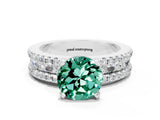 White gold Round Cut Green Sapphire Solitaire Ring with Pavé and Channel Set Band