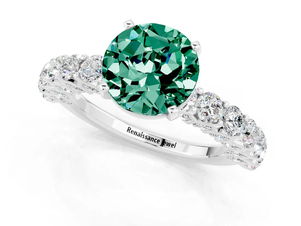 Platinum Round Cut Green Sapphire Solitaire Ring with Shared Prong Pavé Band and Four-Prong Setting