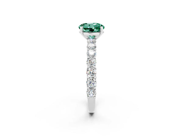 Platinum Round Cut Green Sapphire Solitaire Ring with Shared Prong Pavé Band and Four-Prong Setting