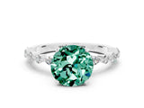 White gold Round Cut Green Sapphire Solitaire with Side Stones on a Pavé Band and Four-Prong Setting