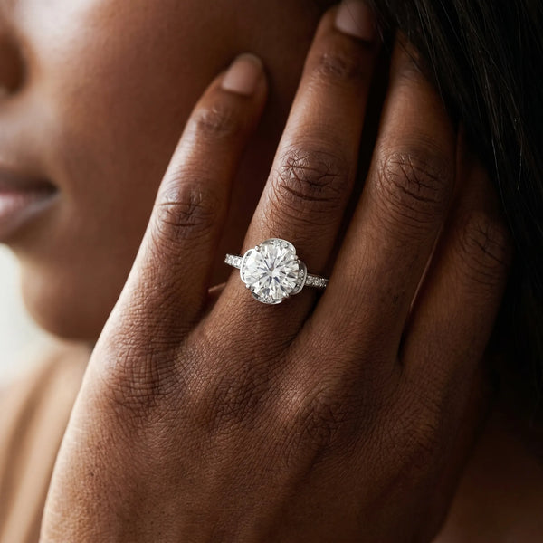 White gold Round Cut Halo Diamond Ring with Channel Set Band and Four-Prong Setting