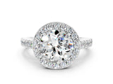 White gold Round Cut Halo Diamond Ring with Pavé Band and Three-Prong Setting