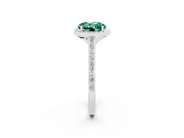 Platinum Round Cut Green Sapphire Halo Engagement Ring with Round Pavé Shoulders and Prong Setting