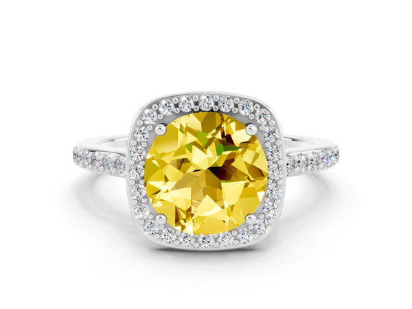 Platinum Round Cut Yellow Sapphire Halo Engagement Ring with Round Pavé Shoulders and Prong Setting