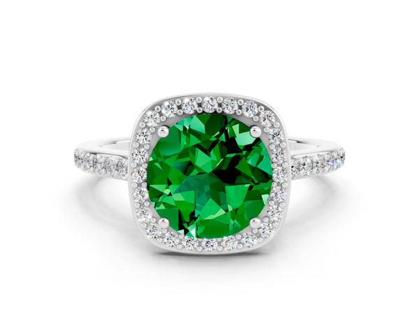 Silver Round Cut Emerald Halo Engagement Ring with Round Pavé Shoulders and Prong Setting