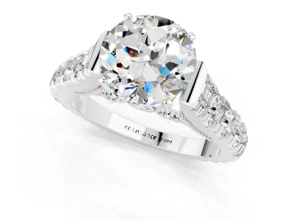 Silver Round Cut Moissanite Classic Solitaire Ring with Pavé Band and Four-Prong Setting