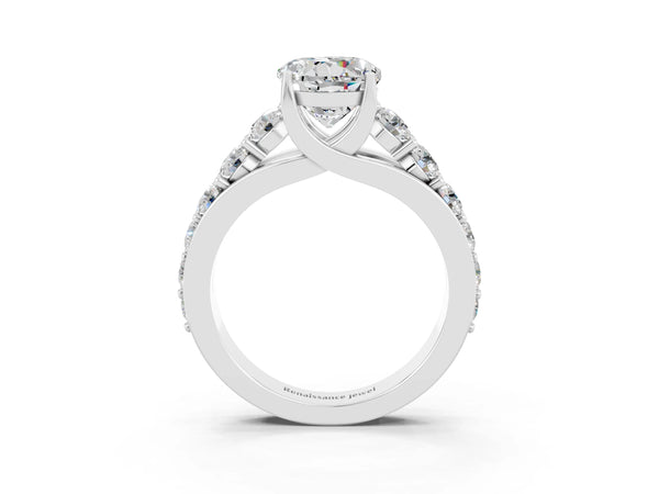 Silver Round Cut Moissanite Engagement Ring with Pavé Band and Four-Prong Setting