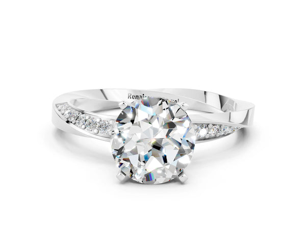 White gold Round Cut Moissanite Engagement Ring with Side Stone Accents and Four-Prong Setting