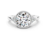 White gold Round Cut Moissanite Halo Ring with Tapered Band and Four-Prong Setting