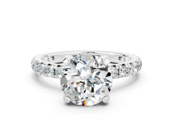 Platinum Round Cut Moissanite Pavé Solitaire Ring with Round Band and Prong Setting