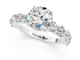 White gold Round Cut Moissanite Prong Setting with Side Stones on a Pave Band_1