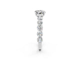 White gold Round Cut Moissanite Prong Setting with Side Stones on a Pave Band_2