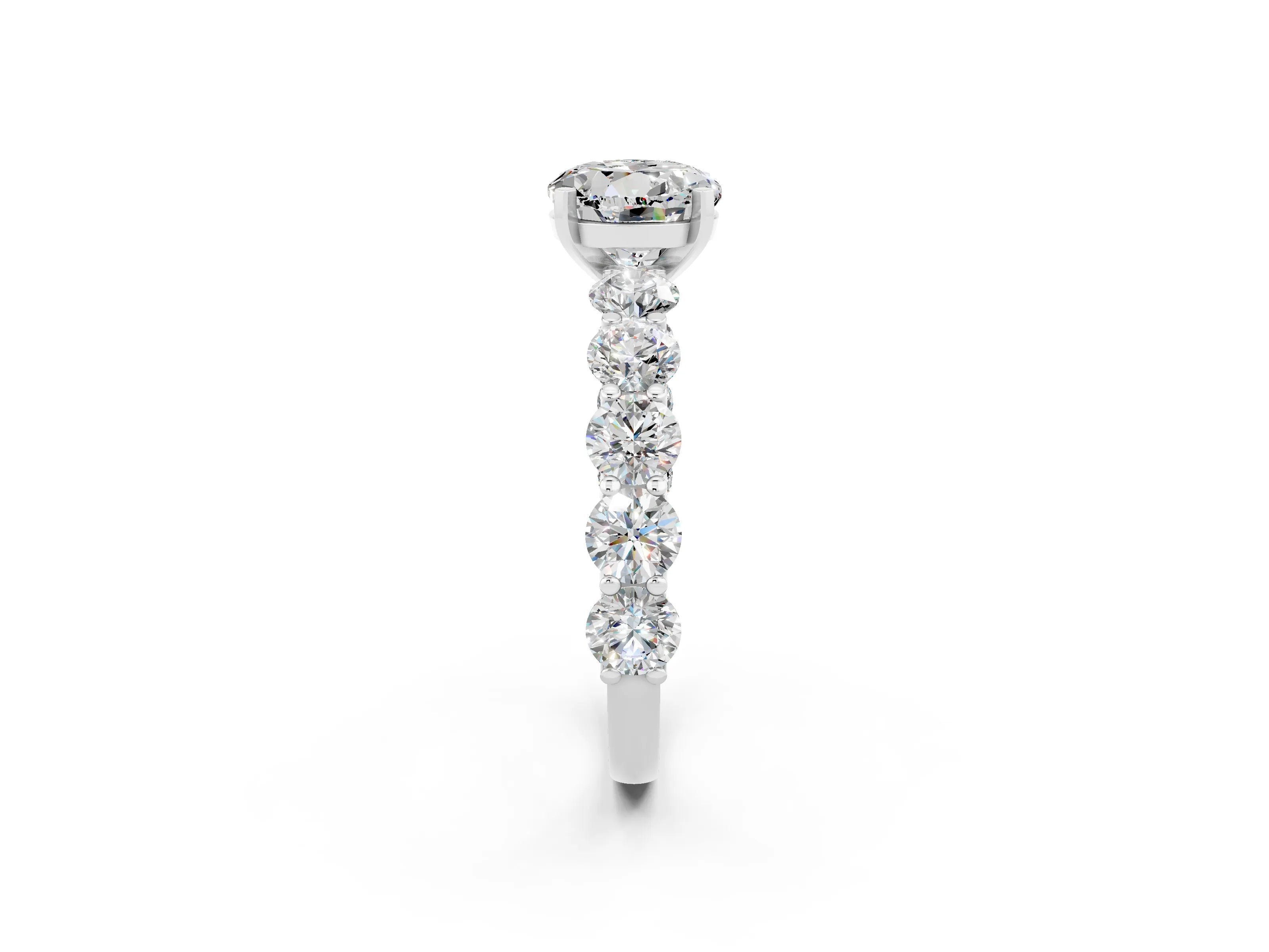 White gold Round Cut Moissanite Prong Setting with Side Stones on a Pave Band_2