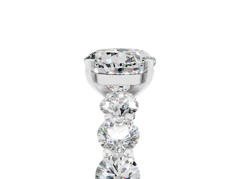 White gold Round Cut Moissanite Prong Setting with Side Stones on a Pave Band_5