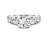 White gold Round Cut Moissanite Prong Setting with Side Stones on a Pave Band