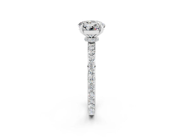 Platinum Round Cut Moissanite Solitaire Engagement Ring with Pavé Band and Four-Prong Setting