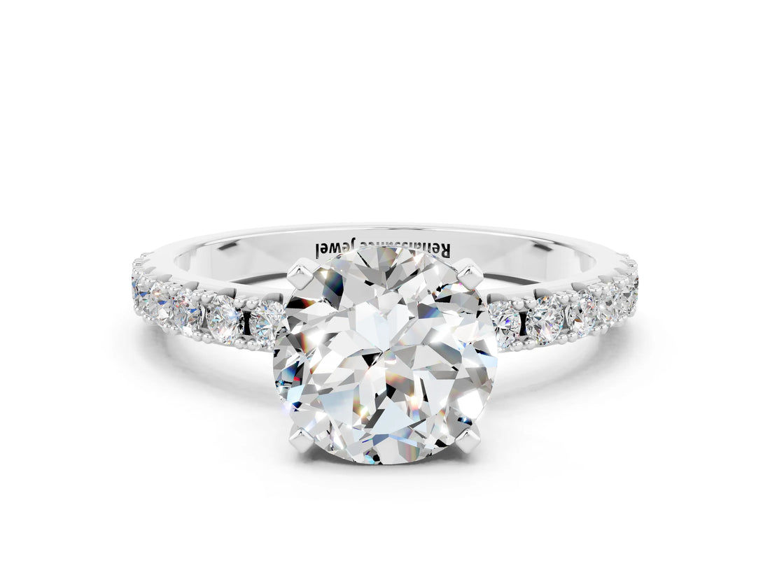 White gold Round Cut Moissanite Solitaire Pavé Band with Four-Prong Setting