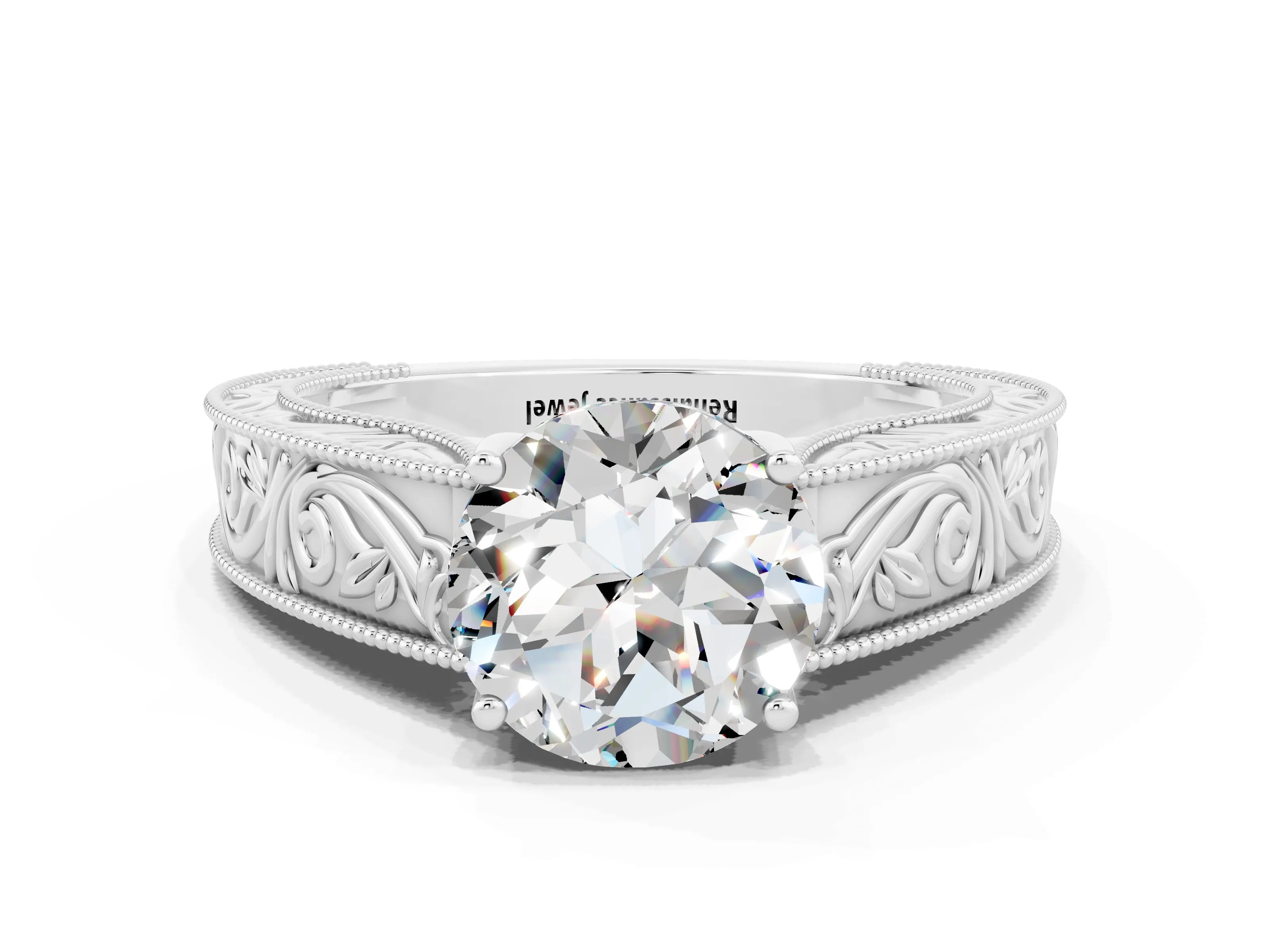 White gold Round Cut Moissanite Solitaire Ring with Engraved Band and Four-Prong Setting