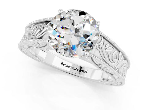 White gold Round Cut Moissanite Solitaire Ring with Engraved Band and Four-Prong Setting_1