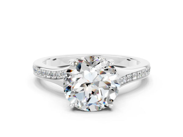 Platinum Round Cut Moissanite Solitaire Ring with Pavé Band and Prong Setting