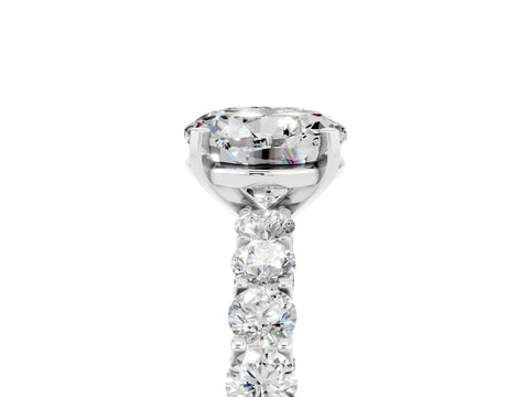 White gold Round Cut Moissanite Solitaire Ring with Shared Prong Pavé Band and Four-Prong Setting_5