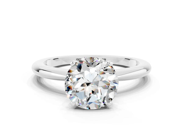 Platinum Round Cut Moissanite Solitaire Ring with Six-Prong Setting and Classic Band