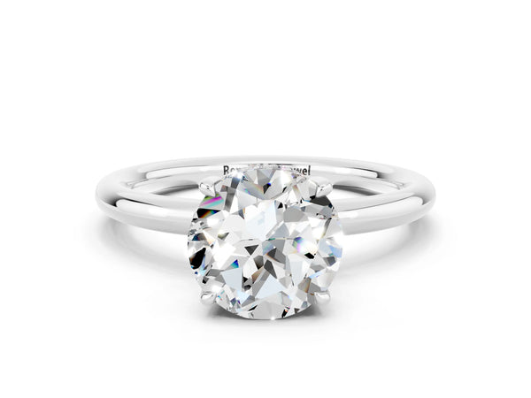 White gold Round Cut Moissanite Solitaire Ring with Thin Band and Four-Prong Setting