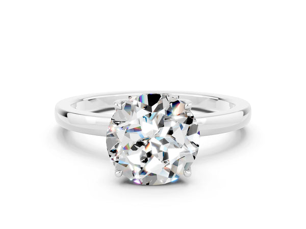 Platinum Round Cut Moissanite Solitaire Ring with Thin Band and Prong Setting