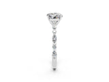 White gold Round Cut Moissanite Solitaire with Side Stones on a Pavé Band and Four-Prong Setting_2