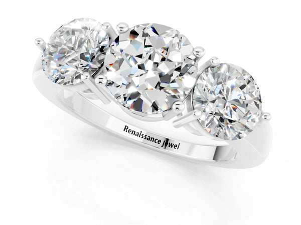 Platinum Round Cut Moissanite Three-Stone Ring with Prong Setting and Classic Band