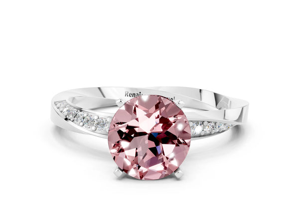 Platinum Round Cut Morganite Engagement Ring with Side Stone Accents and Four-Prong Setting