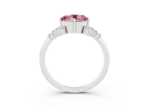 Platinum Round Cut Morganite Ring with Side Stones and Four-Prong Setting
