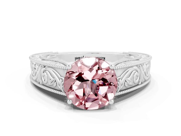Platinum Round Cut Morganite Solitaire Ring with Engraved Band and Four-Prong Setting