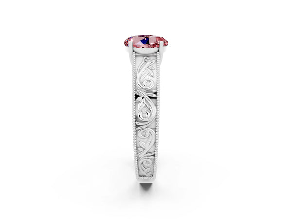 Platinum Round Cut Morganite Solitaire Ring with Engraved Band and Four-Prong Setting