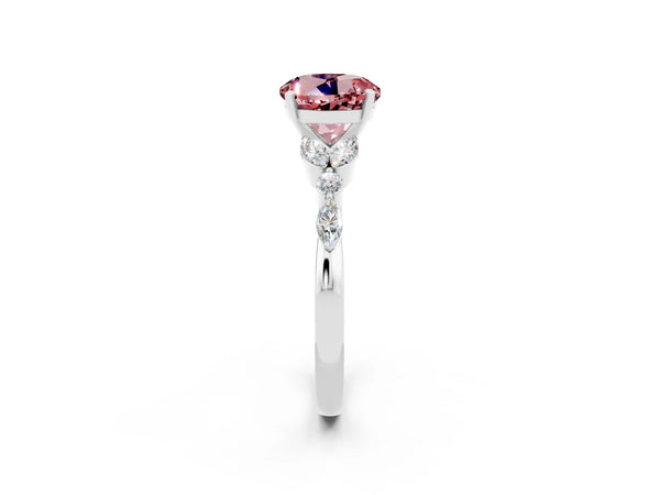 Platinum Round Cut Morganite Solitaire Ring with Side Stones and Four-Prong Setting