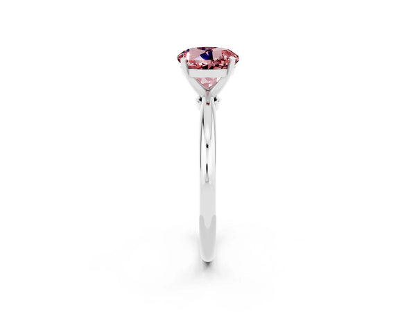 Platinum Round Cut Morganite Solitaire Ring with Six-Prong Setting and Classic Band