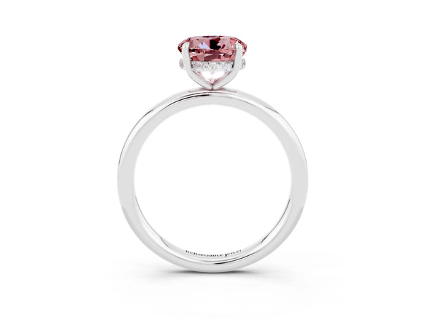 Platinum Round Cut Morganite Solitaire Ring with Thin Band and Four-Prong Setting