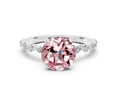 White gold Round Cut Morganite Solitaire with Side Stones on a Pavé Band and Four-Prong Setting
