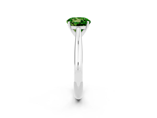 Platinum Round Cut Peridot Solitaire Engagement Ring with Cathedral Setting and Four-Prong Mount