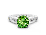 White gold Round Cut Peridot Solitaire with Side Baguettes and Channel Set Band