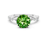 White gold Round Cut Peridot Solitaire with Side Stones on a Pavé Band and Four-Prong Setting