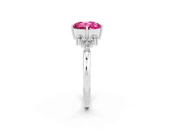 Platinum Round Cut Pink Sapphire Ring with Side Stones and Four-Prong Setting