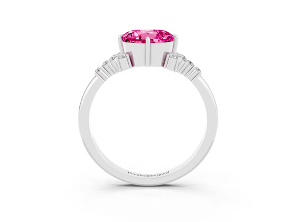 Silver Round Cut Pink Sapphire Ring with Side Stones and Four-Prong Setting