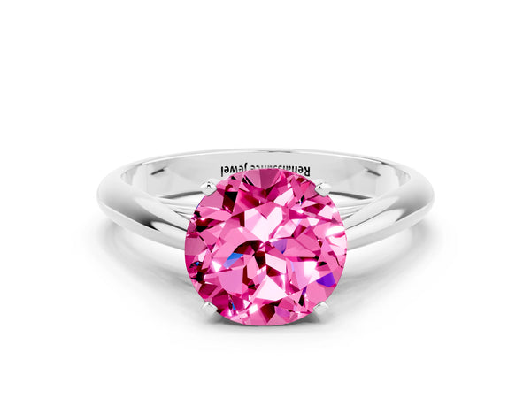 Silver Round Cut Pink Sapphire Solitaire Engagement Ring with Cathedral Setting and Four-Prong Mount