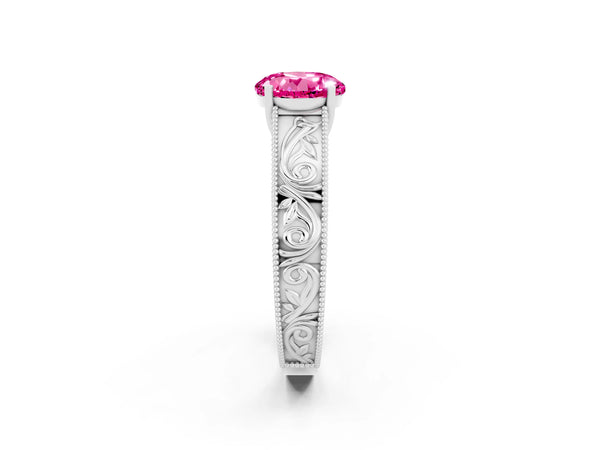 Platinum Round Cut Pink Sapphire Solitaire Ring with Engraved Band and Four-Prong Setting
