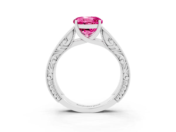 Platinum Round Cut Pink Sapphire Solitaire Ring with Engraved Band and Four-Prong Setting