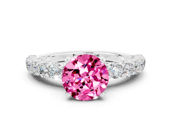 Silver Round Cut Pink Sapphire Solitaire Ring with Shared Prong Pavé Band and Four-Prong Setting