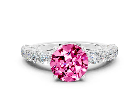 White gold Round Cut Pink Sapphire Solitaire Ring with Shared Prong Pavé Band and Four-Prong Setting